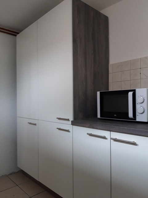 Im Obergeschoss steht Ihnen eine gemeinschaftliche Küche mit einer